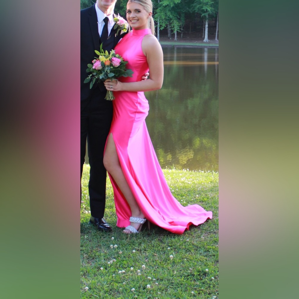 Jessica Angel bright pink evening gown with deep open back